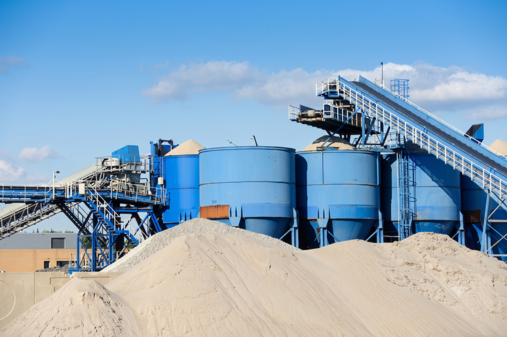 Heavy-duty tramp iron extraction and vibrating equipment for cement plants.
